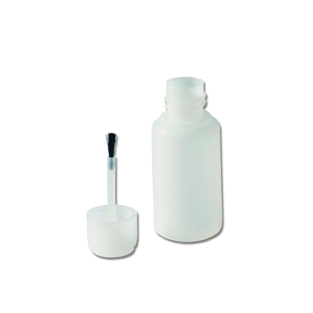Botella para las lechadas con el pincel en la tuerca Botella para las lechadas con el pincel en la tuerca